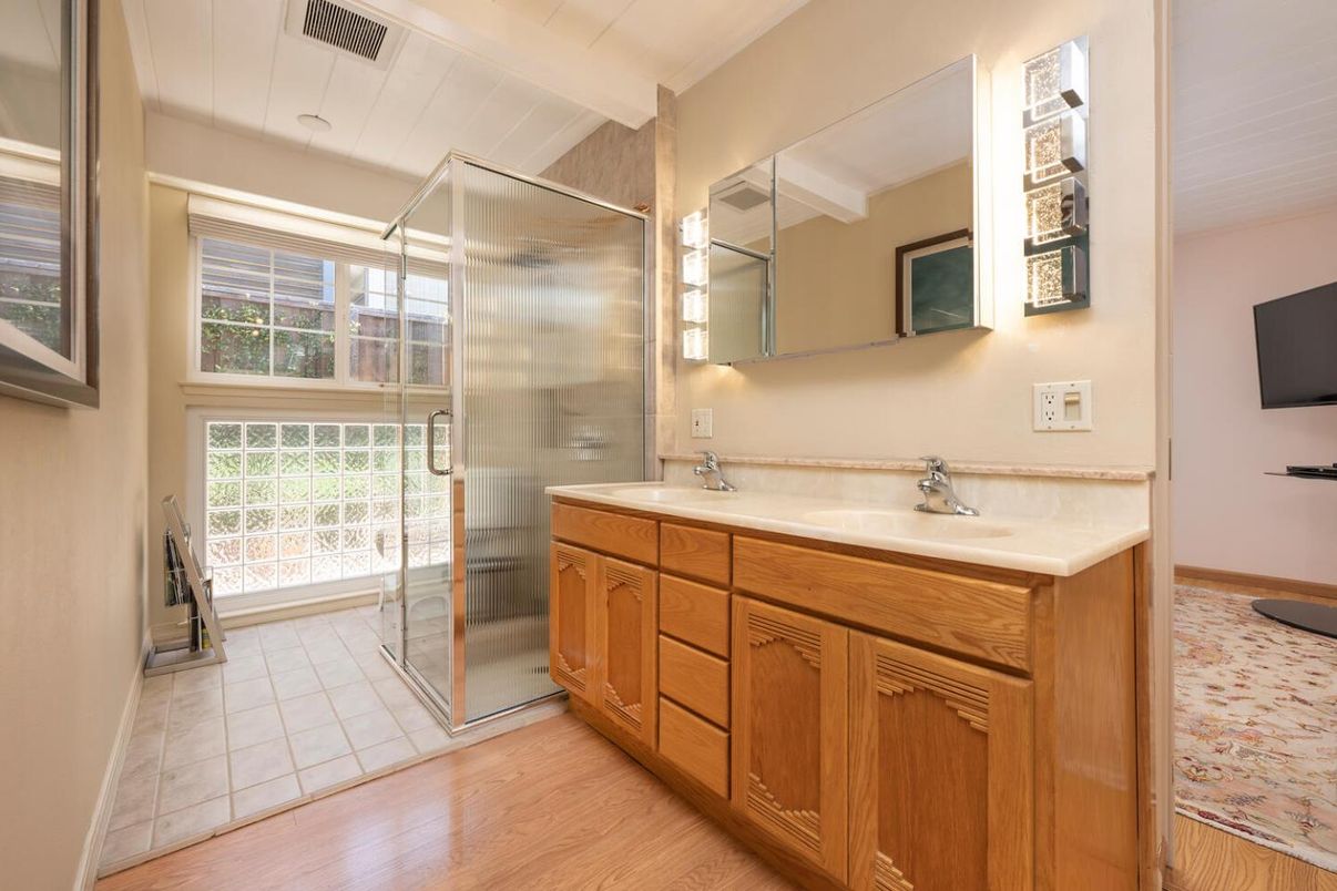 Bathroom, Dual Sink Vanities, Glass Shower, Interior, Wood Texture Flooring