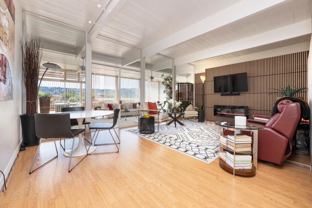 Dining room, Fireplace, Interior, Living room, Recessed Lighting, Wood Texture Flooring