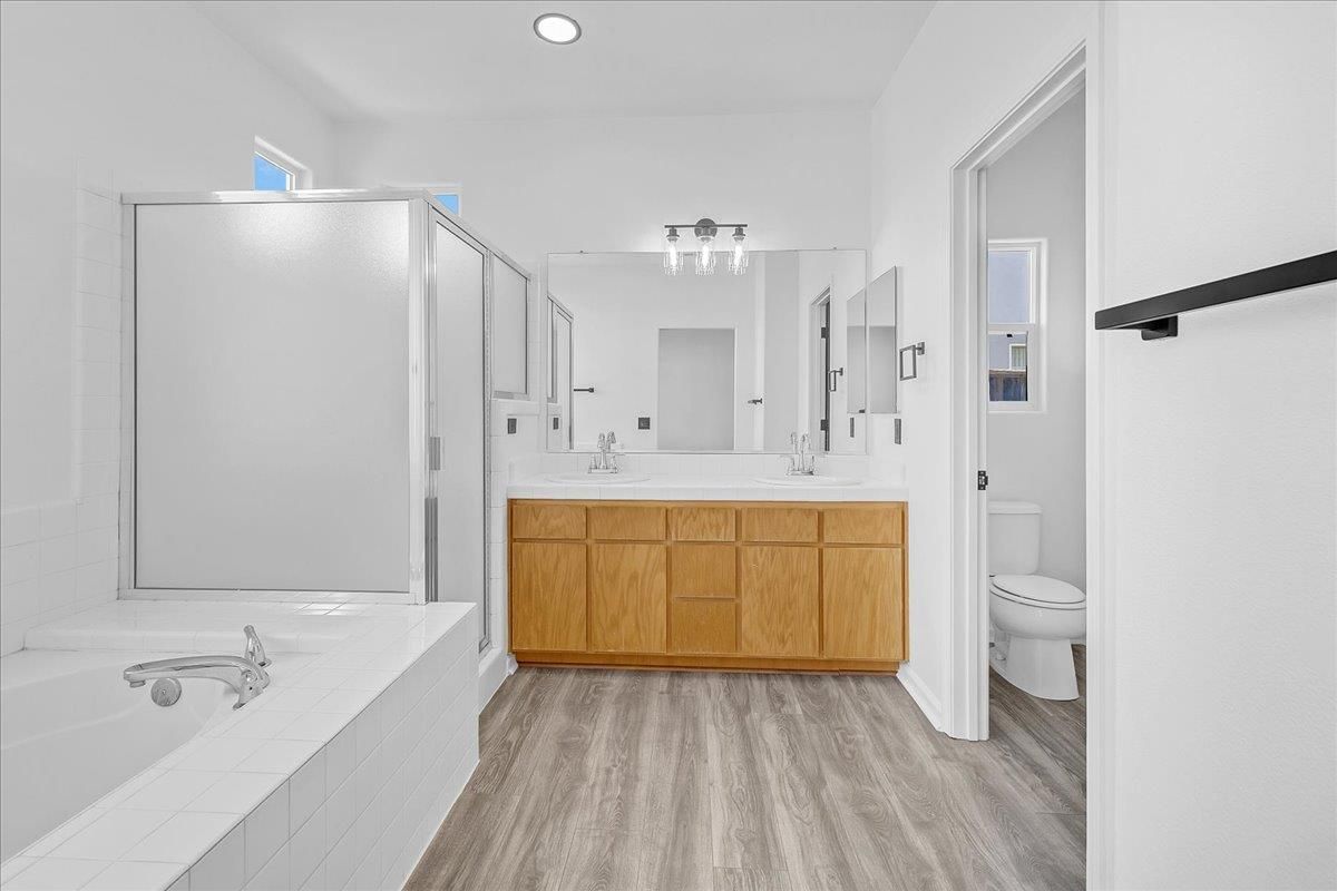 Bathroom, Dual Sink Vanities, Interior, Recessed Lighting, Wood Texture Flooring