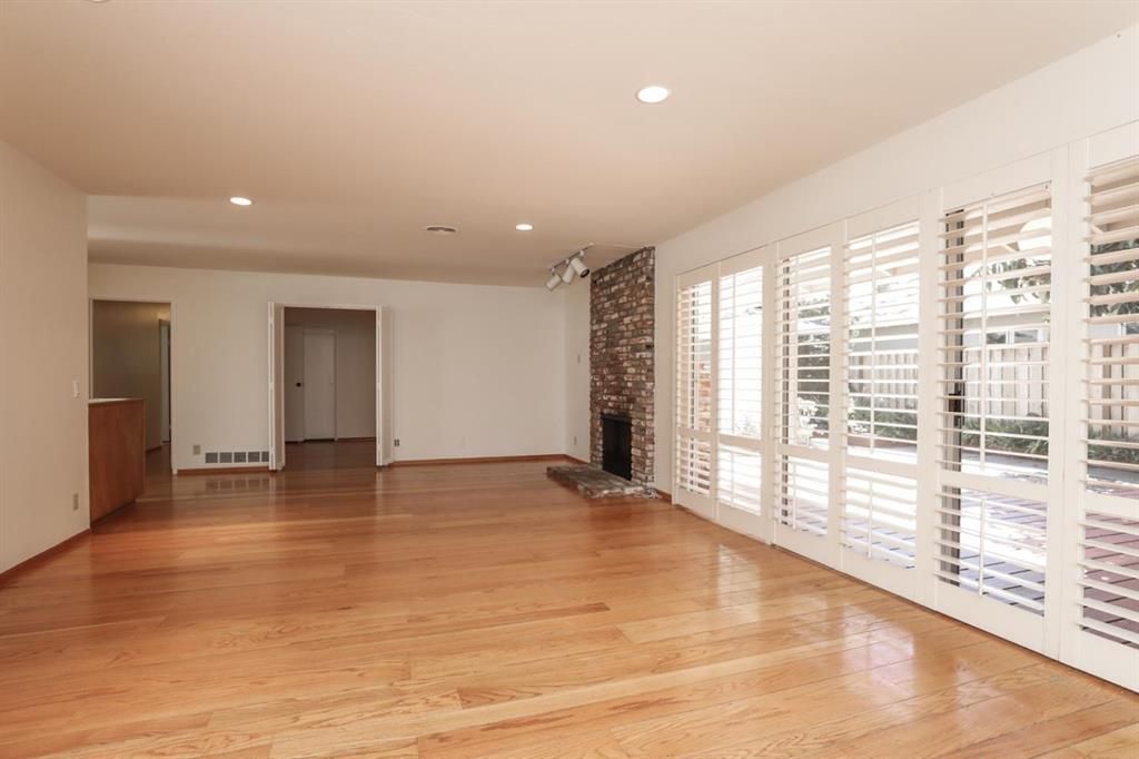 Empty room, Fireplace, Interior, Recessed Lighting, Wood Texture Flooring