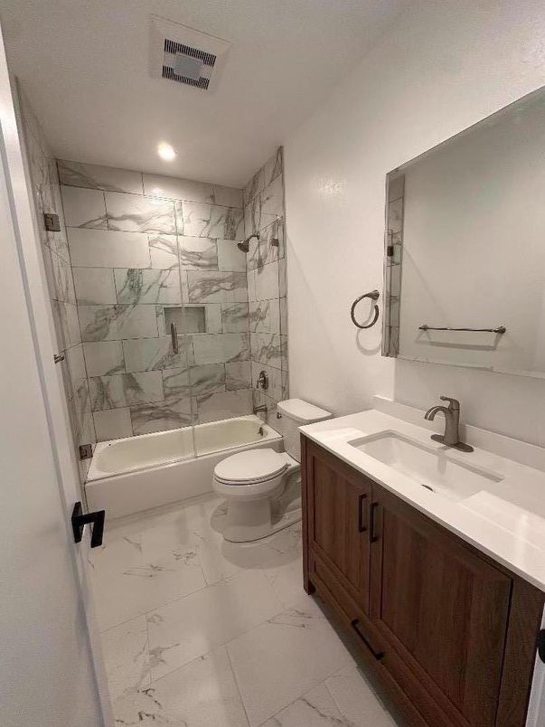 Bathroom, Dual Sink Vanities, Interior, Marble, Marble Walls, Recessed Lighting