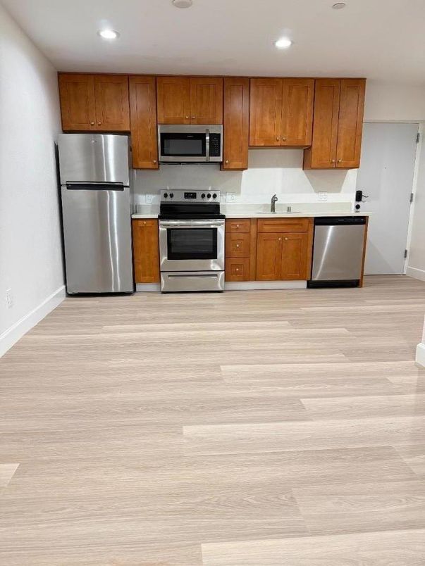 Interior, Kitchen, Recessed Lighting, Stainless Steel Appliances, Wood Texture Flooring