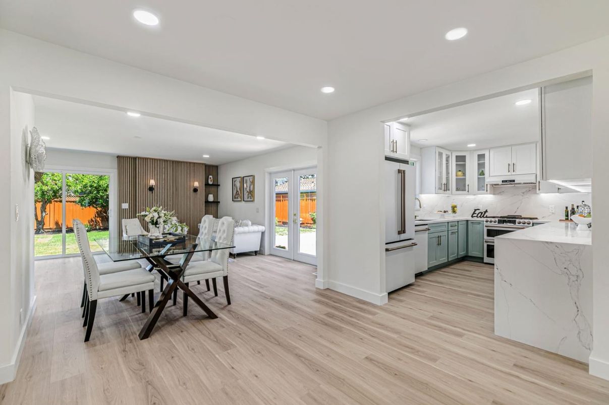 Dining room, Interior, Kitchen, Marble Walls, Pendant Lights, Recessed Lighting, Stainless Steel Appliances, Wood Texture Flooring