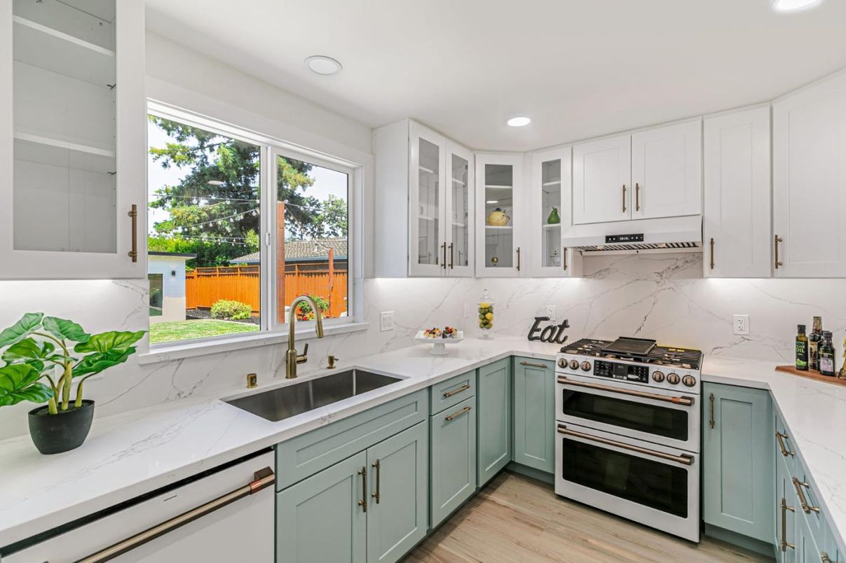Interior, Kitchen, Marble Walls, Recessed Lighting, Stainless Steel Appliances, Wood Texture Flooring