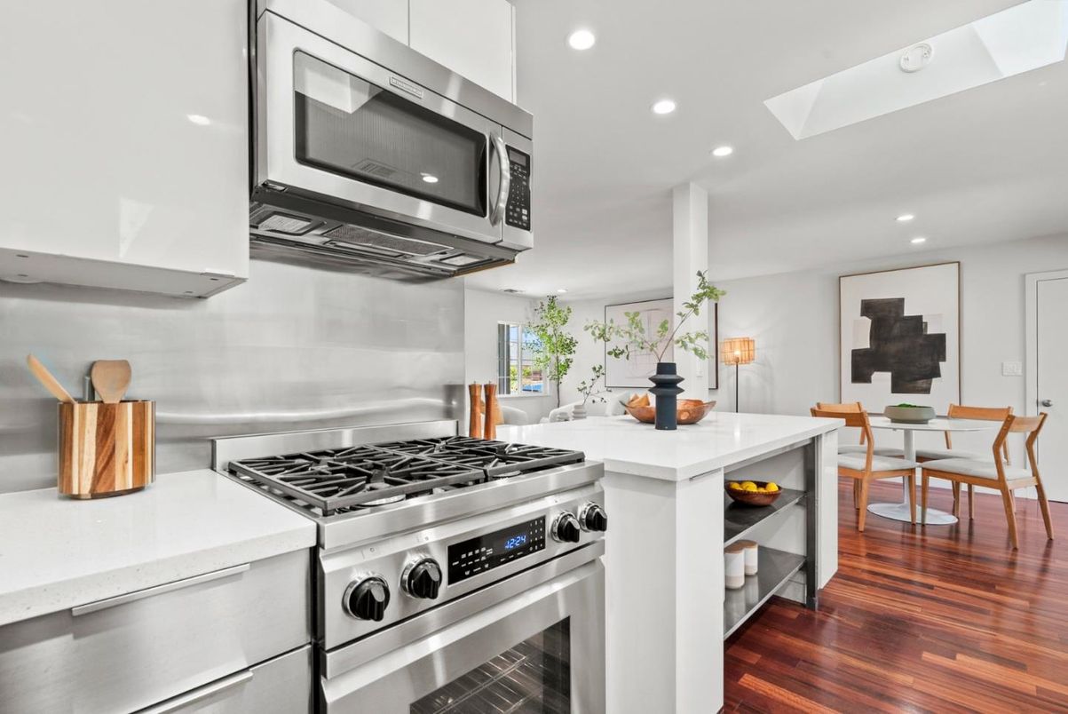 Dining room, Interior, Kitchen, Recessed Lighting, Stainless Steel Appliances, Wood Texture Flooring