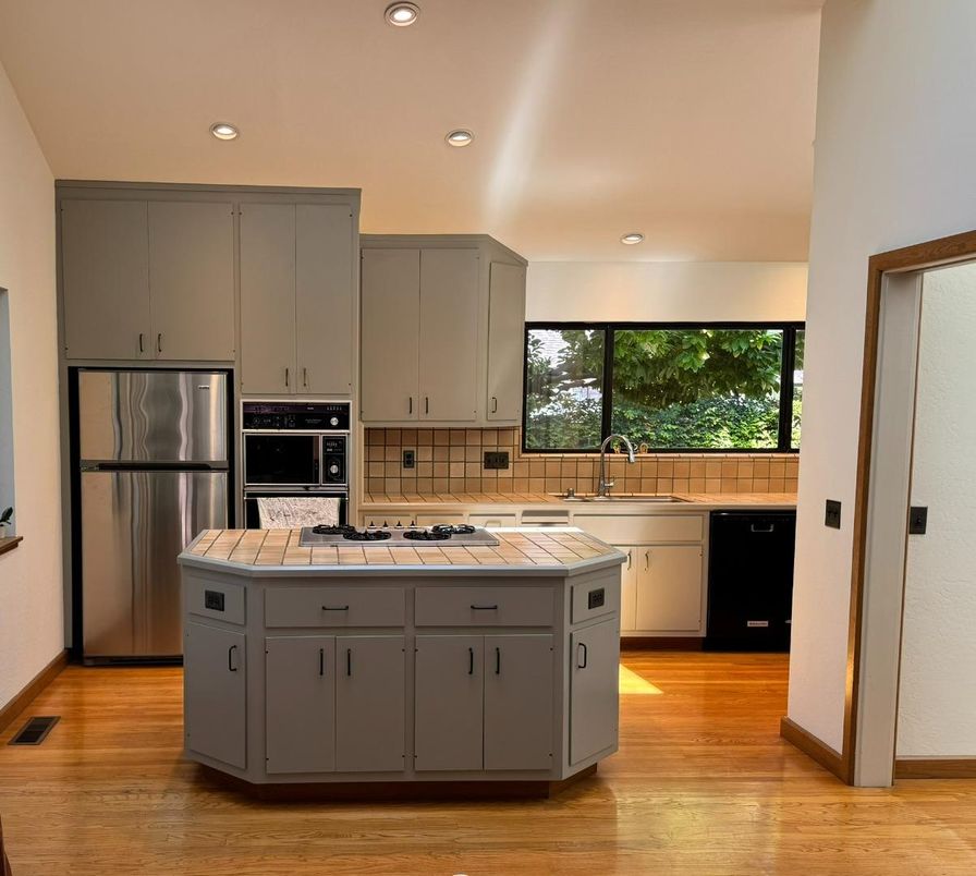Interior, Kitchen, Recessed Lighting, Tile Countertops, Wood Texture Flooring