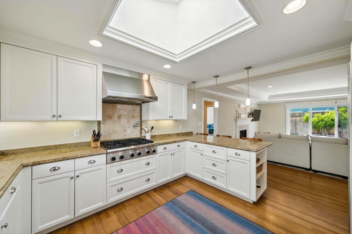 Fireplace, Interior, Kitchen, Pendant Lights, Recessed Lighting, Stainless Steel Appliances, Wood Texture Flooring