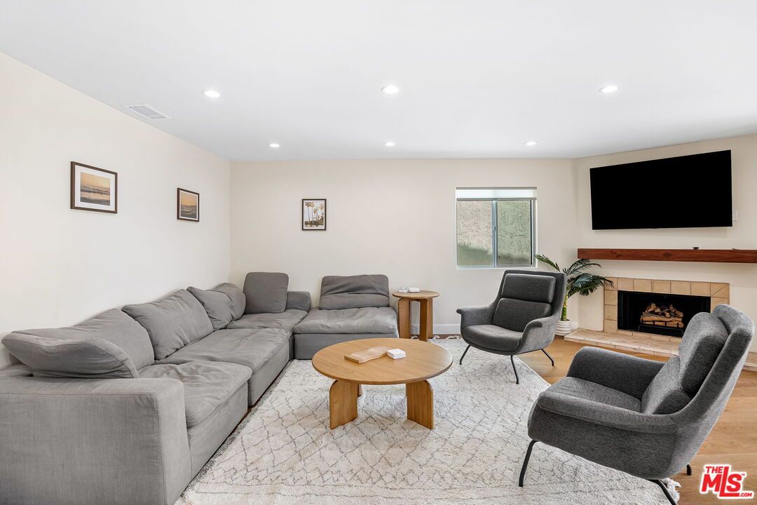 Fireplace, Interior, Living room, Recessed Lighting, Wood Texture Flooring