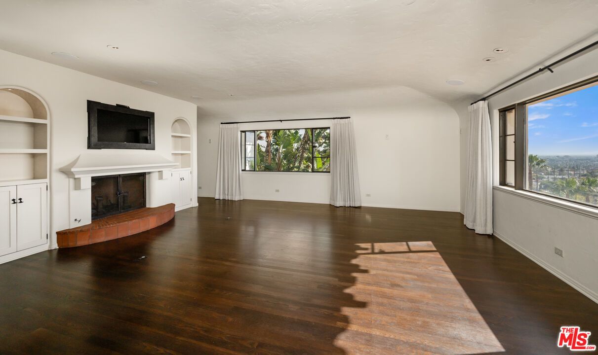 Empty room, Fireplace, Interior, Recessed Lighting, Wood Texture Flooring