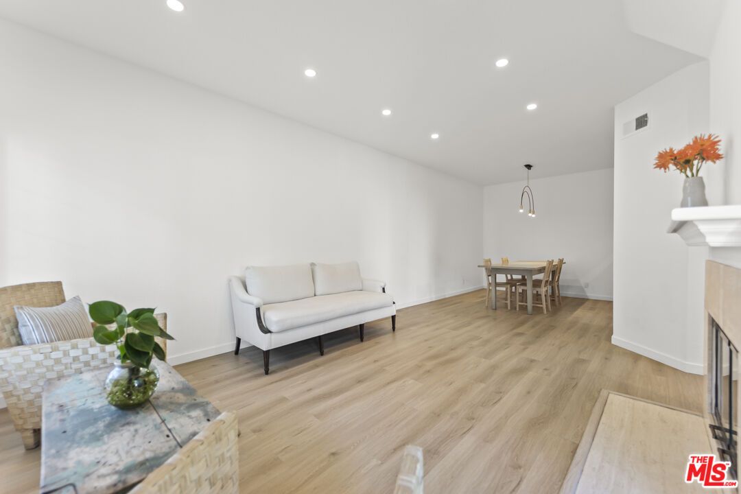 Dining room, Fireplace, Interior, Pendant Lights, Recessed Lighting, Wood Texture Flooring