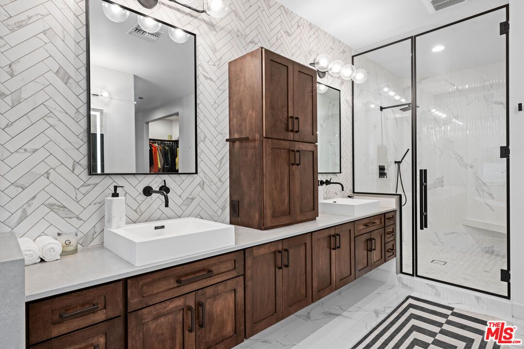 Bathroom, Dual Sink Vanities, Glass Shower, Interior, Marble, Marble Walls, Recessed Lighting