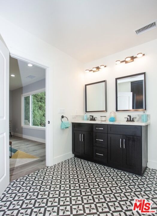 Bathroom, Dual Sink Vanities, Interior, Recessed Lighting, Wood Texture Flooring