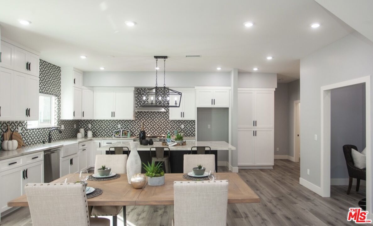 Dining room, Interior, Kitchen, Pendant Lights, Recessed Lighting, Stainless Steel Appliances, Wood Texture Flooring