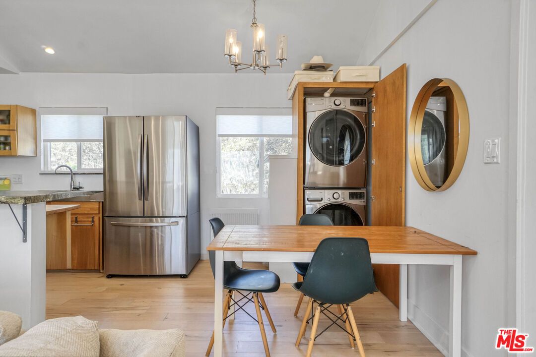 Chandelier, Dining room, Interior, Kitchen, Recessed Lighting, Washer, Wood Texture Flooring