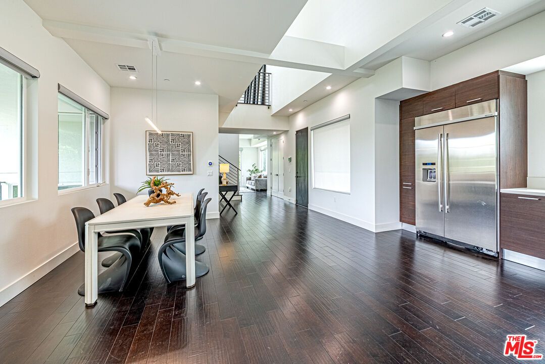Dining room, Interior, Pendant Lights, Recessed Lighting, Stainless Steel Appliances, Wood Texture Flooring