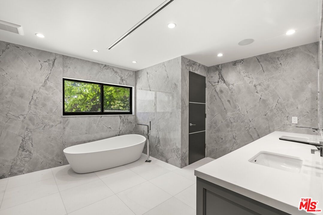 Bathroom, Dual Sink Vanities, Free Standing Baths, Interior, Marble Walls, Recessed Lighting