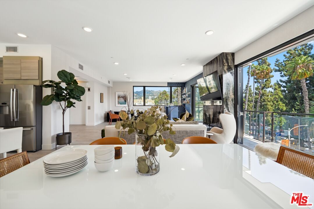 Dining room, Interior, Kitchen, Living room, Recessed Lighting, Stainless Steel Appliances, Wood Texture Flooring