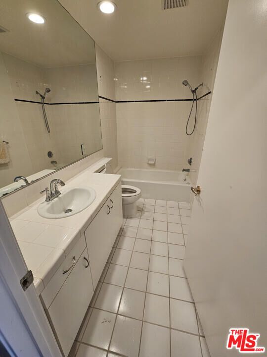 Bathroom, Dual Sink Vanities, Interior, Recessed Lighting, Tile Countertops
