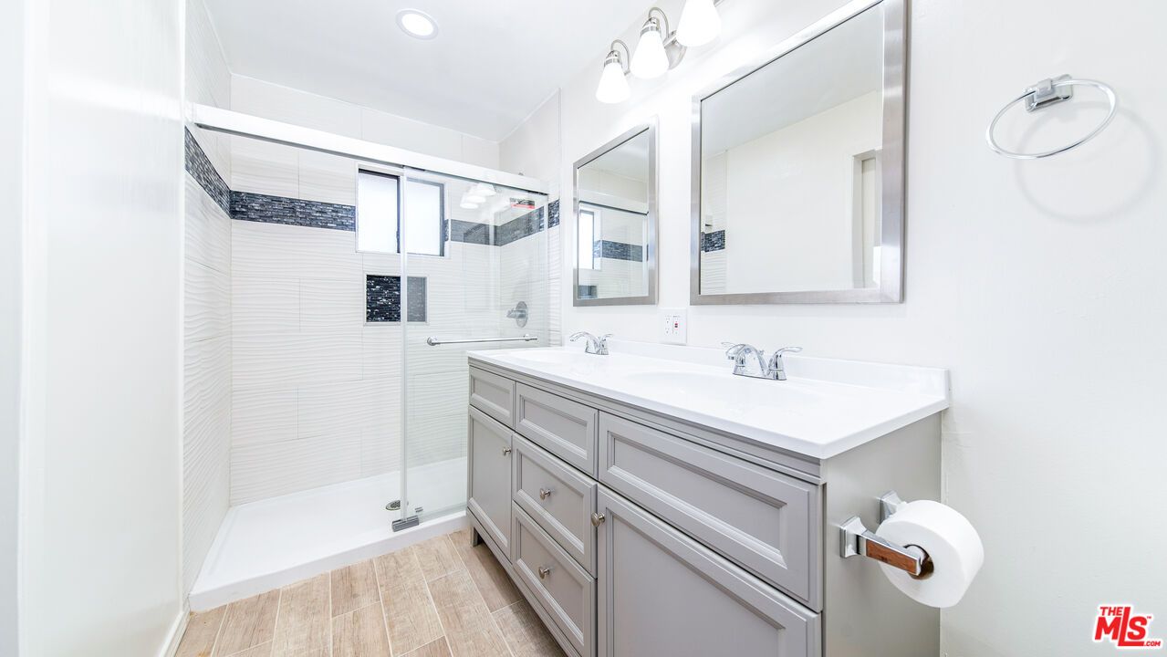 Bathroom, Dual Sink Vanities, Glass Shower, Interior, Recessed Lighting, Wood Texture Flooring