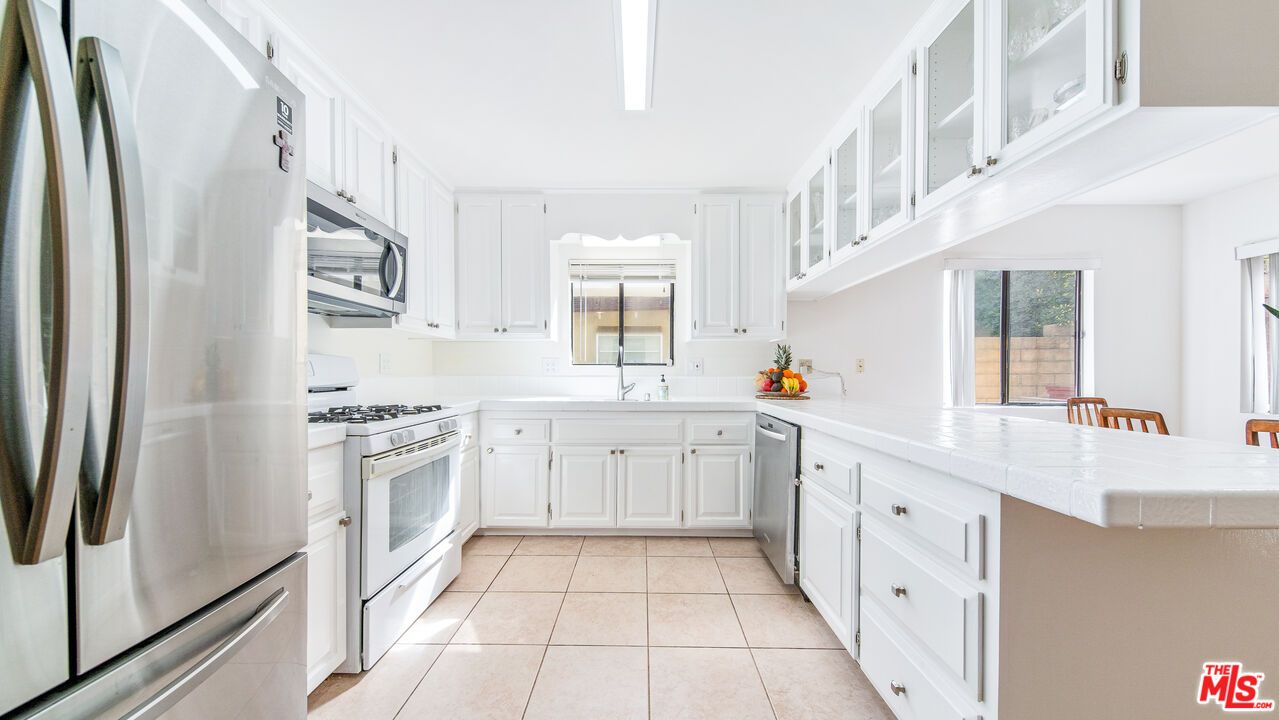 Interior, Kitchen, Stainless Steel Appliances, Tile Countertops