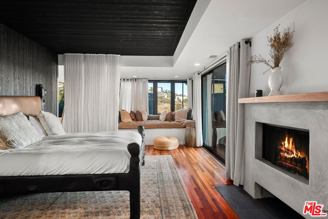 Bedroom, Fireplace, Interior, Recessed Lighting, Wood Texture Flooring