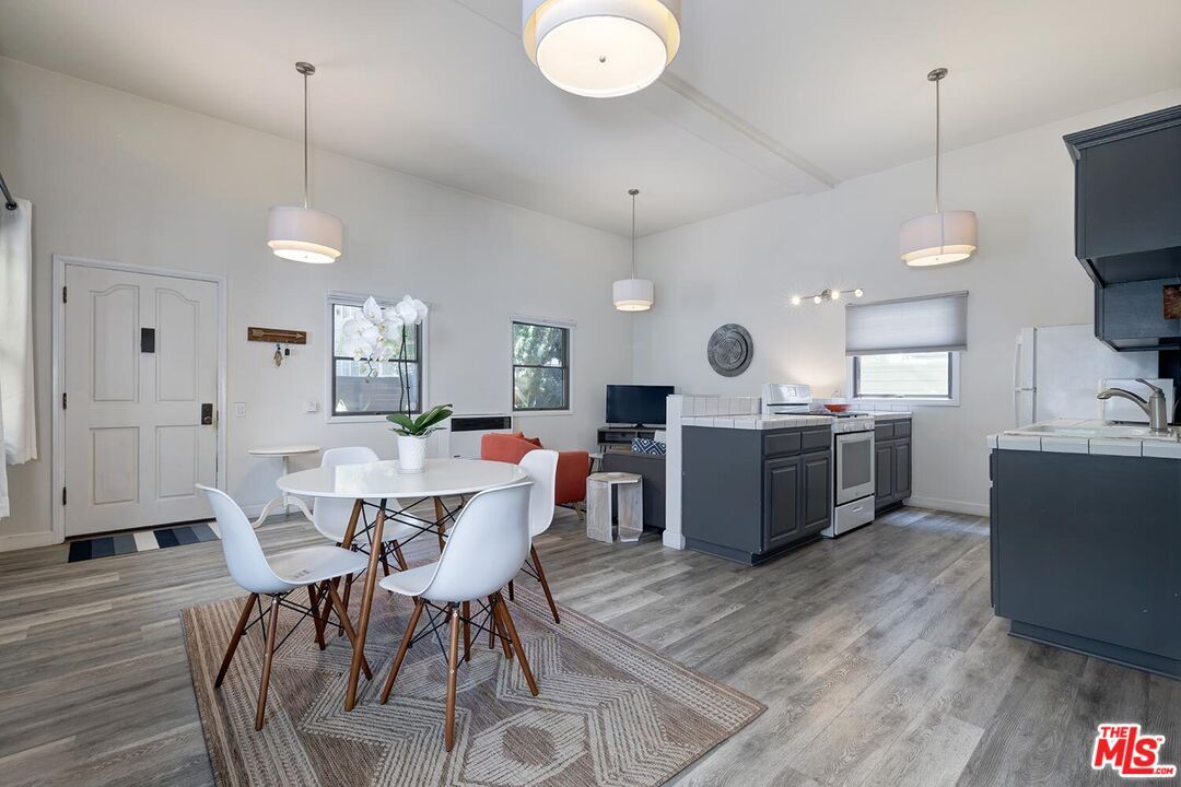 Dining room, Interior, Kitchen, Pendant Lights, Tile Countertops, Wood Texture Flooring