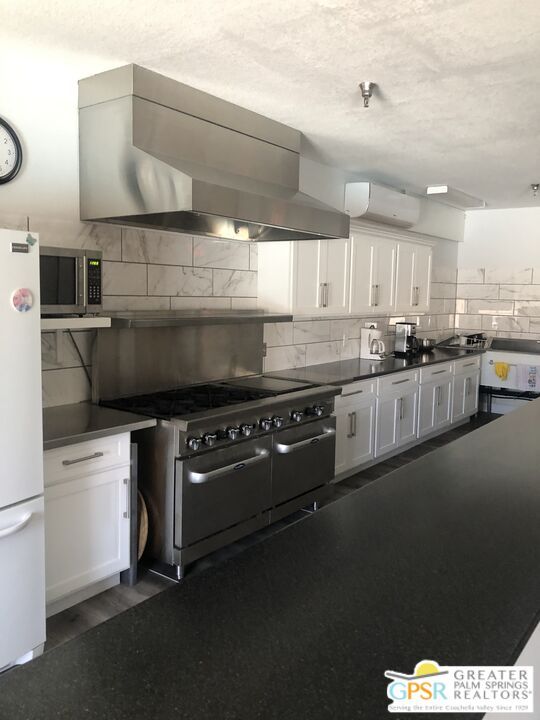 Interior, Kitchen, Marble Walls, Stainless Steel Appliances