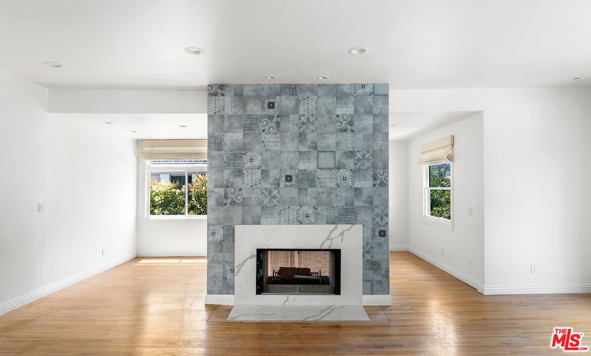Empty room, Fireplace, Interior, Recessed Lighting, Wood Texture Flooring
