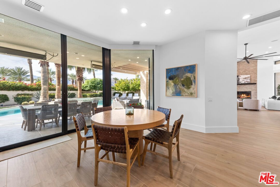 Dining room, Fireplace, Interior, Pendant Lights, Recessed Lighting, Wood Texture Flooring