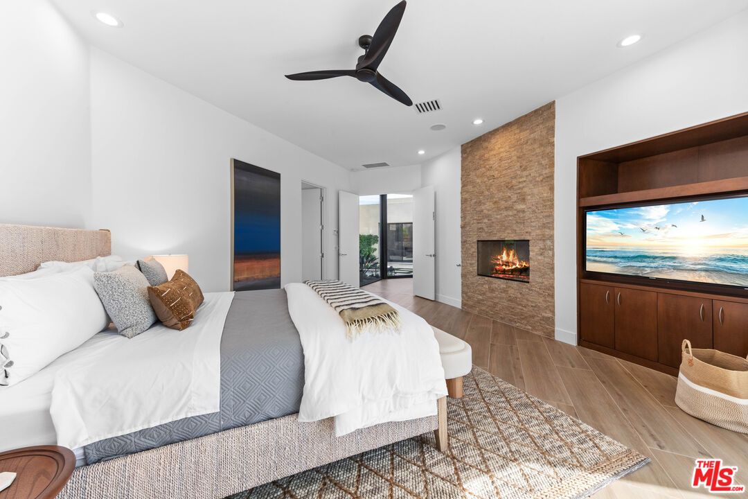 Bedroom, Fireplace, Interior, Recessed Lighting, Wood Texture Flooring