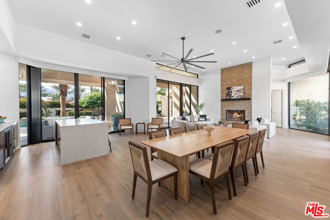 Dining room, Fireplace, Interior, Kitchen, Pendant Lights, Recessed Lighting, Wood Texture Flooring