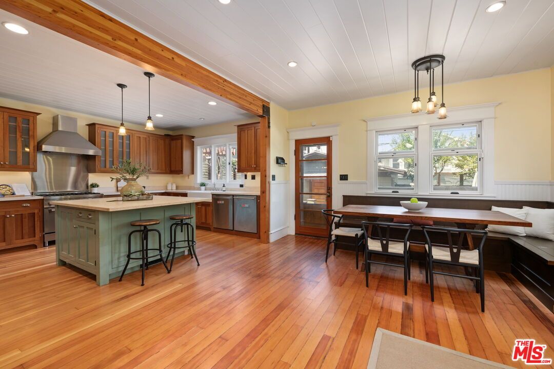 Dining room, Interior, Kitchen, Pendant Lights, Recessed Lighting, Stainless Steel Appliances, Wood Texture Flooring