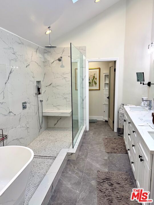 Bathroom, Dual Sink Vanities, Free Standing Baths, Glass Shower, Interior, Marble Walls, Recessed Lighting
