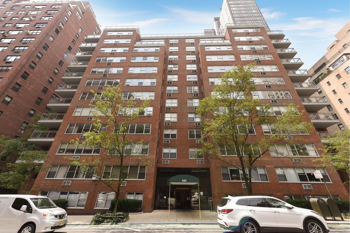 Exterior, Facade, Brick Facade, Condo Building