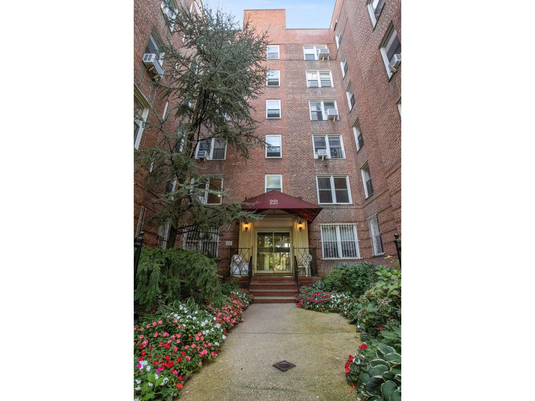 Exterior, Facade, Brick Facade, Condo Building