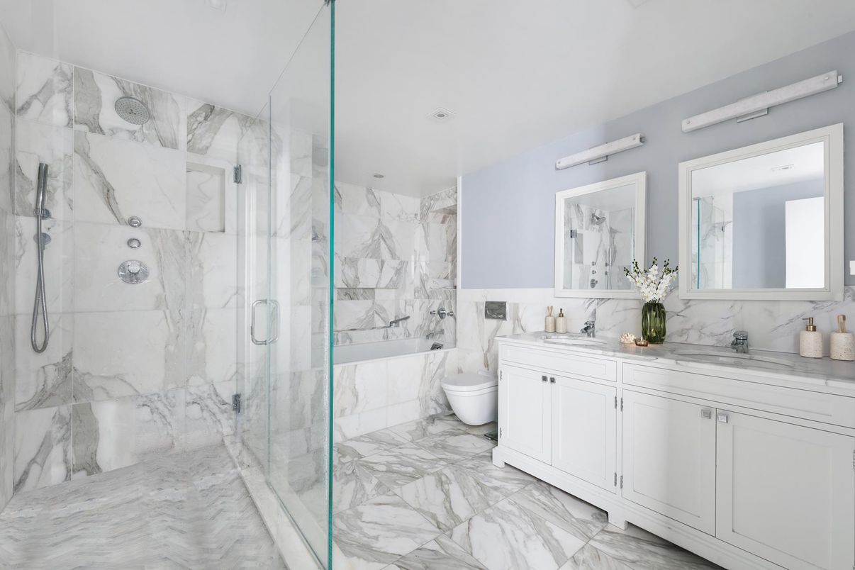 Bathroom, Dual Sink Vanities, Glass Shower, Interior, Marble, Marble Walls, Recessed Lighting