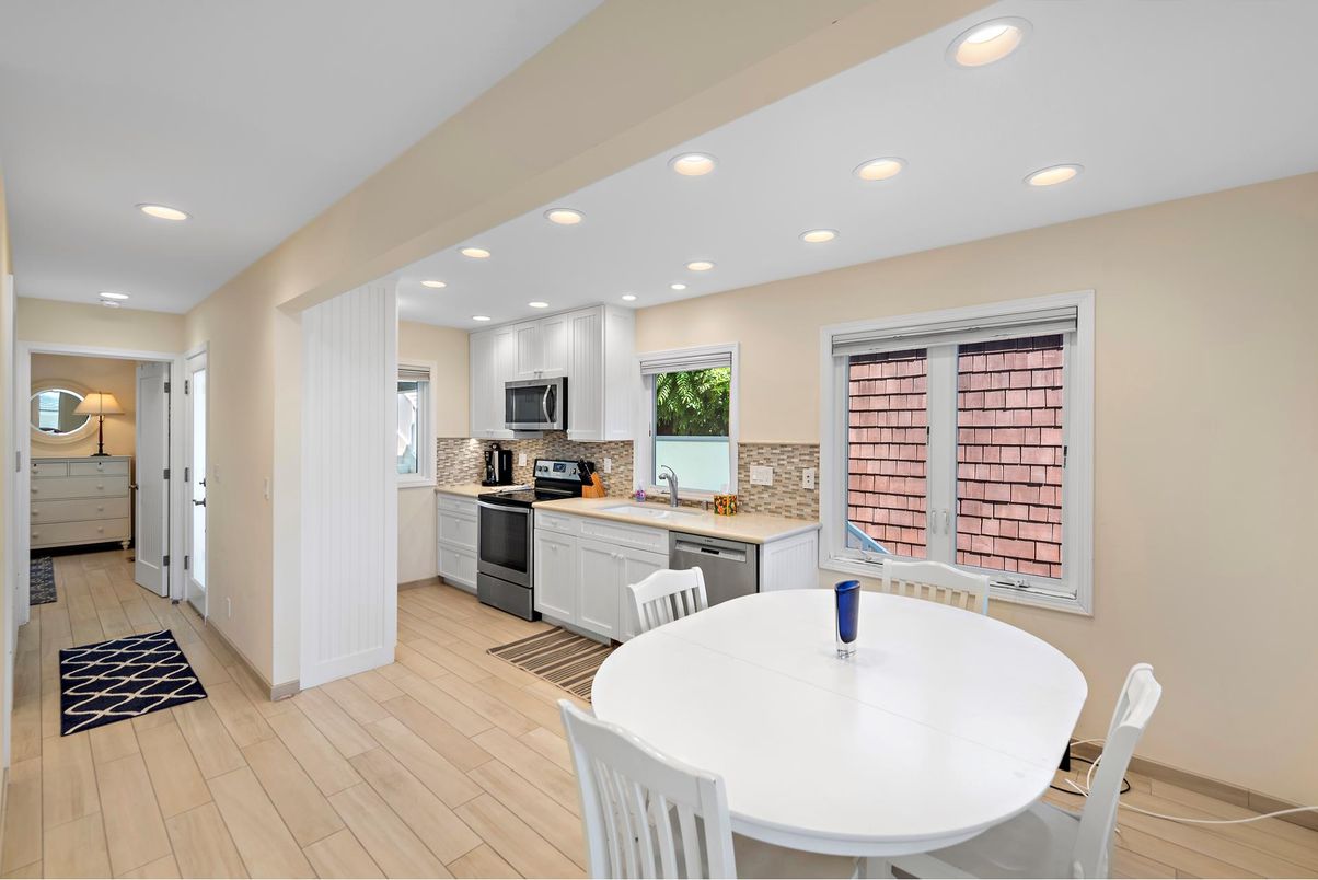 Dining room, Interior, Kitchen, Recessed Lighting, Stainless Steel Appliances, Wood Texture Flooring