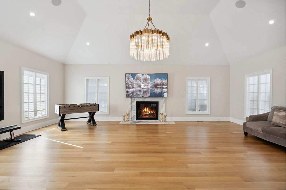 Chandelier, Fireplace, Game Room, Interior, Recessed Lighting, Wood Texture Flooring