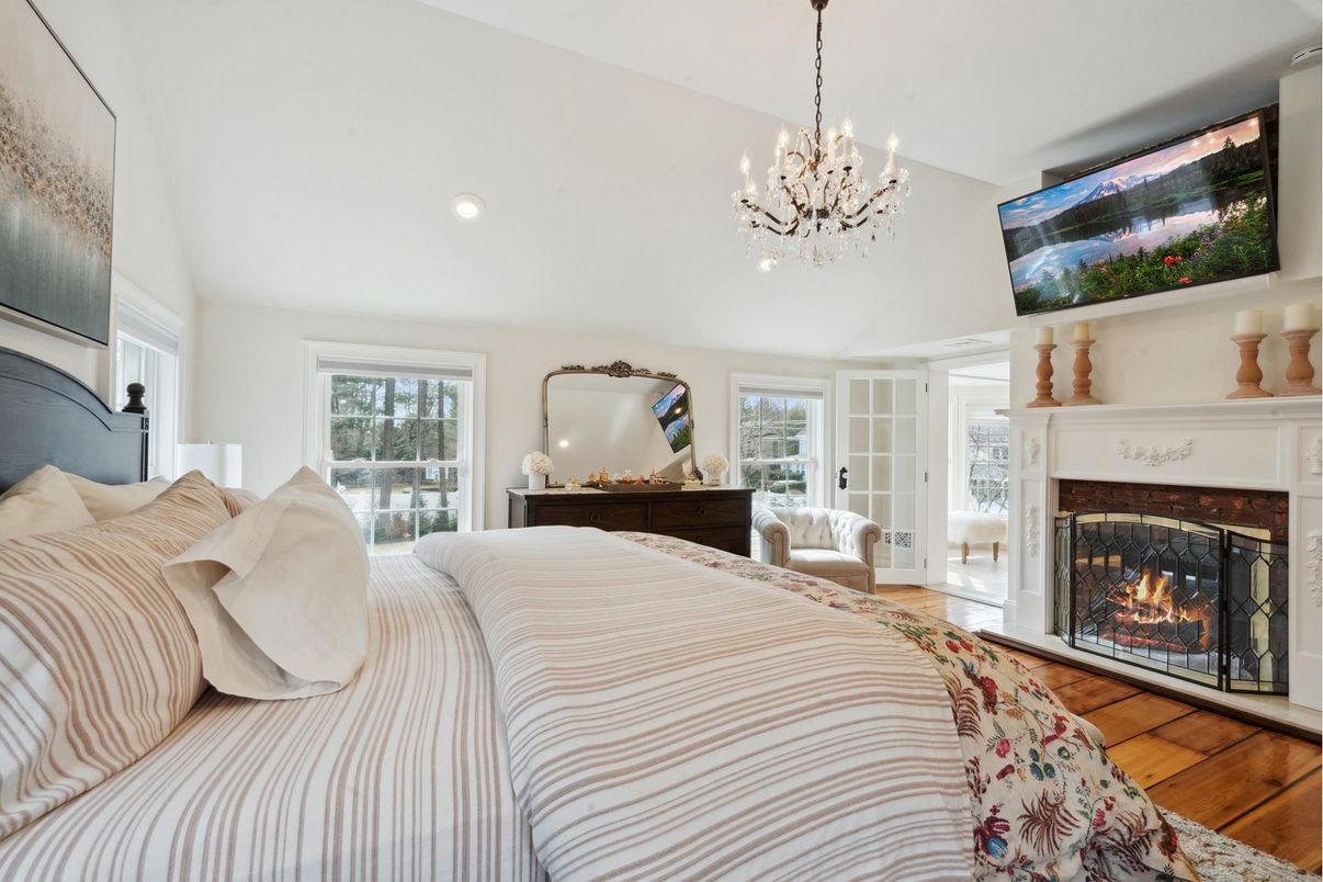 Bedroom, Chandelier, Fireplace, Interior, Recessed Lighting, Wood Texture Flooring