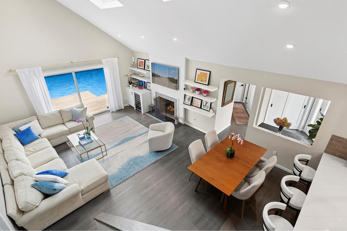 Dining room, Fireplace, Interior, Living room, Recessed Lighting, Wood Texture Flooring