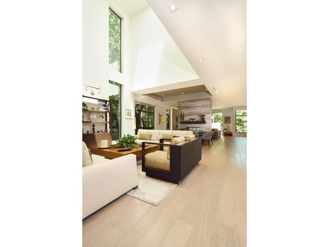 Dining room, Fireplace, Interior, Living room, Recessed Lighting, Wood Texture Flooring