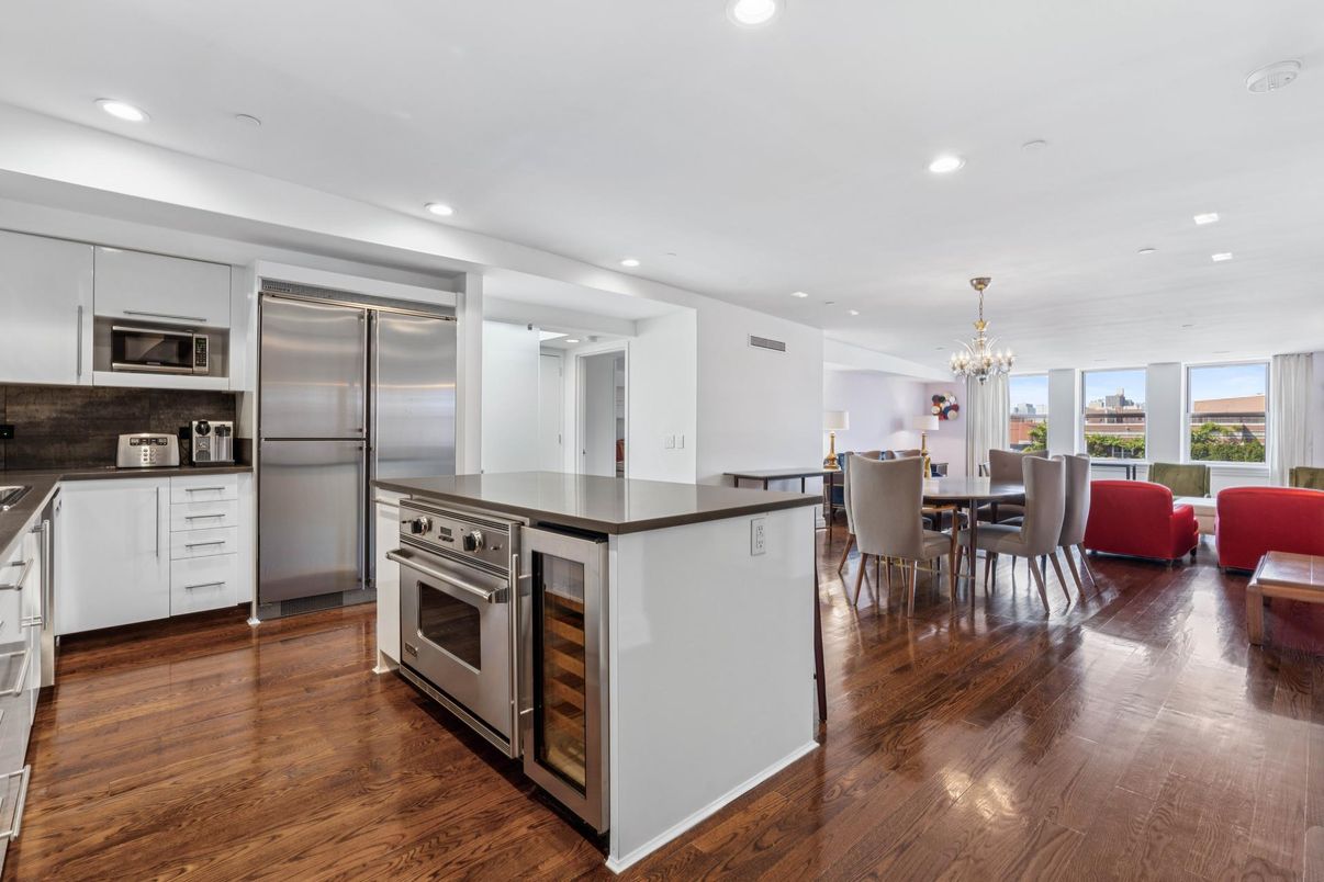 Chandelier, Dining room, Interior, Kitchen, Recessed Lighting, Stainless Steel Appliances, Wood Texture Flooring