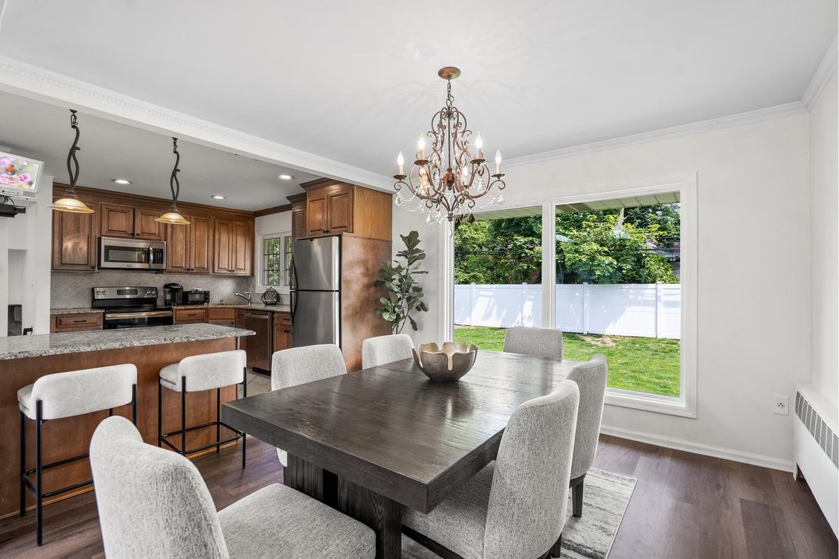 Chandelier, Dining room, Interior, Kitchen, Recessed Lighting, Stainless Steel Appliances, Wood Texture Flooring