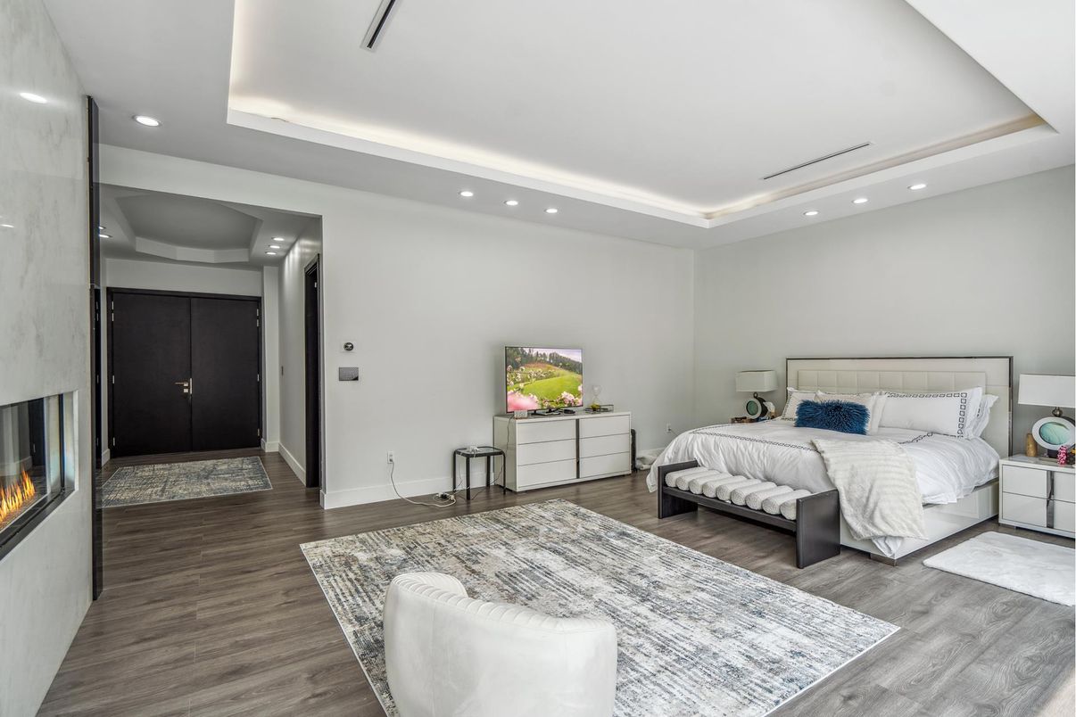Bedroom, Fireplace, Interior, Recessed Lighting, Wood Texture Flooring