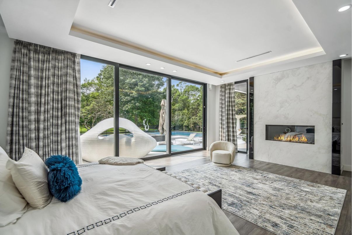 Bedroom, Fireplace, Interior, Marble Walls, Recessed Lighting, Wood Texture Flooring