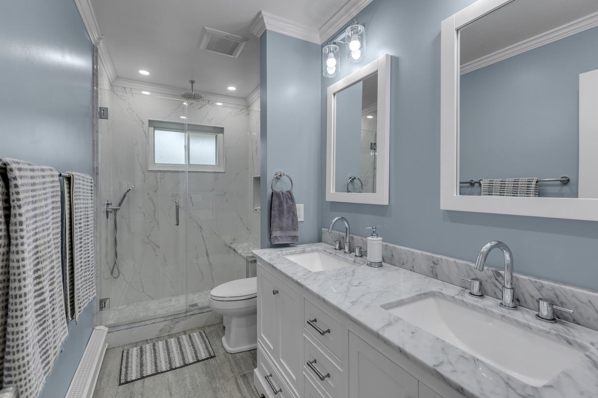 Bathroom, Dual Sink Vanities, Glass Shower, Interior, Marble Walls, Recessed Lighting