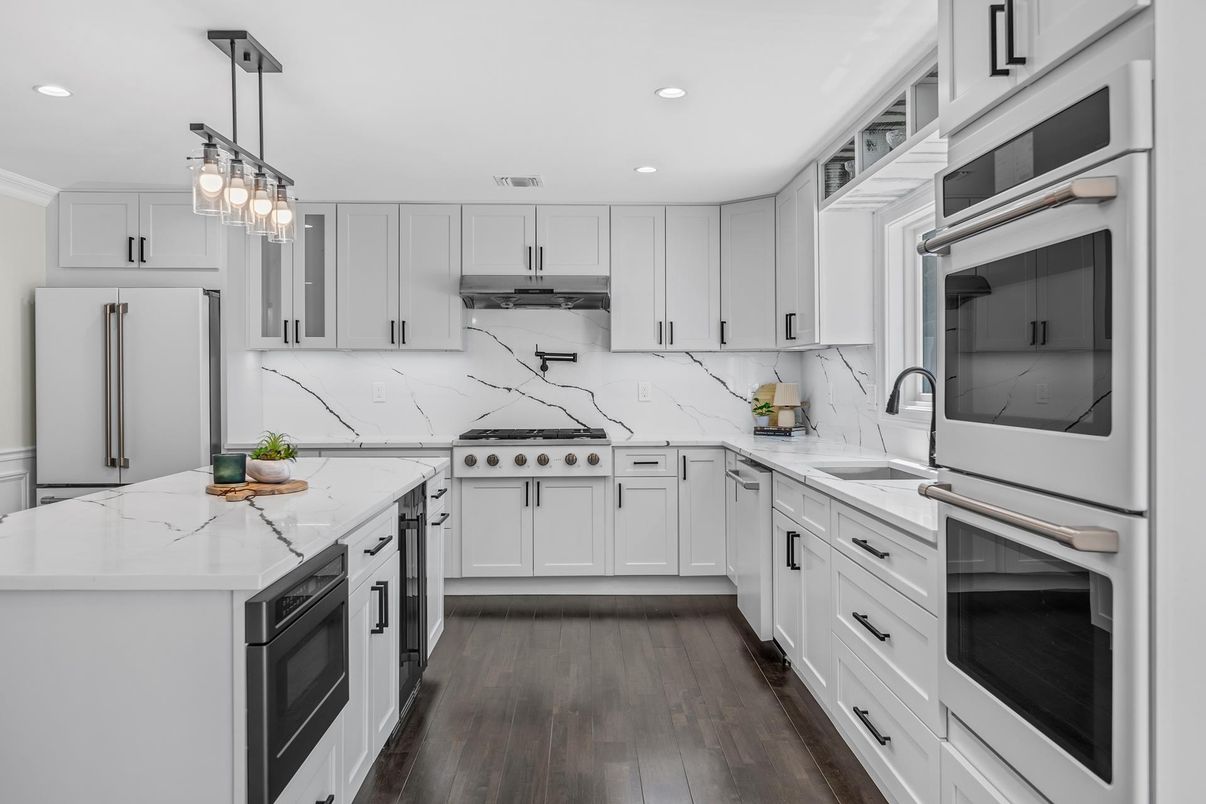 Interior, Kitchen, Marble Walls, Pendant Lights, Recessed Lighting, Stainless Steel Appliances, Wood Texture Flooring