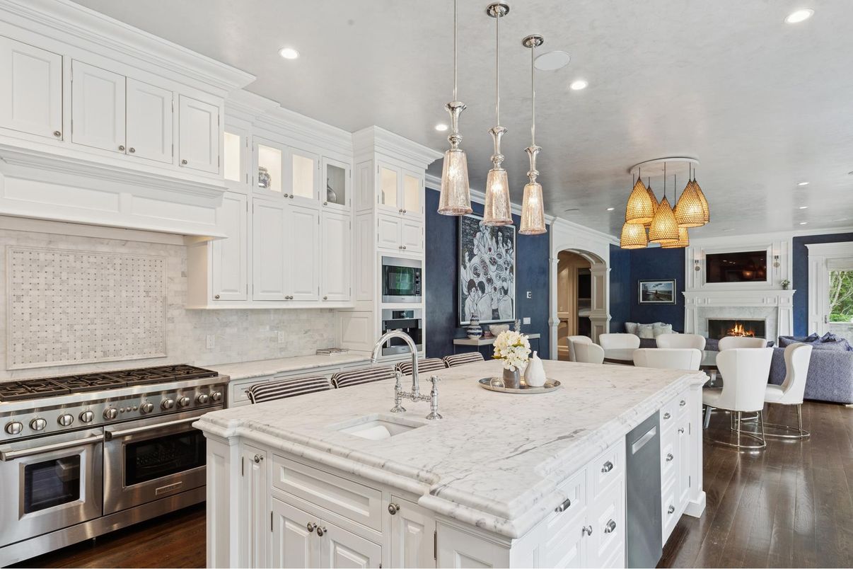 Dining room, Fireplace, Interior, Kitchen, Living room, Pendant Lights, Recessed Lighting, Stainless Steel Appliances, Wood Texture Flooring