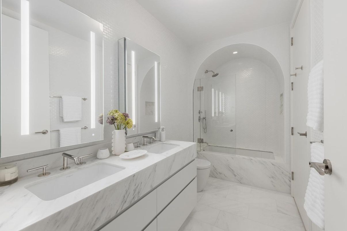 Bathroom, Dual Sink Vanities, Glass Shower, Interior, Marble, Marble Walls, Recessed Lighting