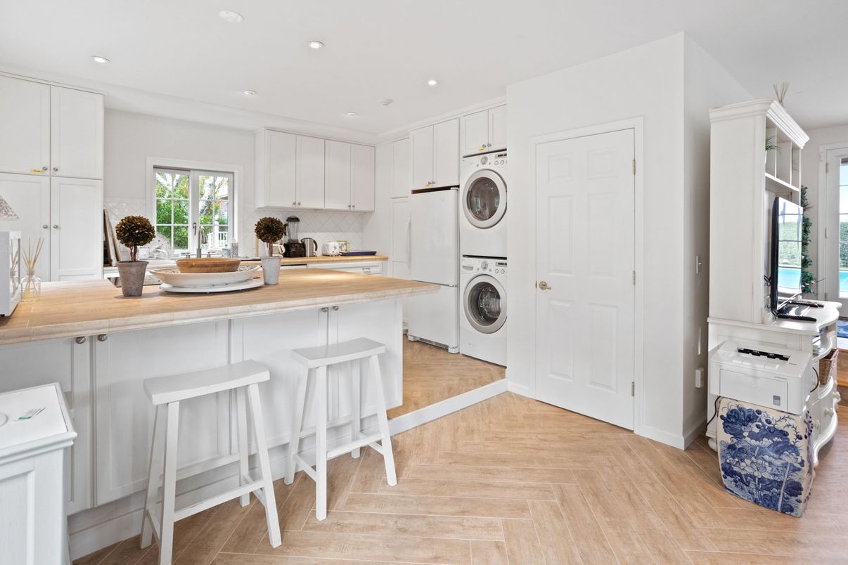 Interior, Kitchen, Recessed Lighting, Washer, Wood Texture Flooring